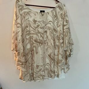BEAUTIFUL, tan and cream colored blouse with a cape sleeve design.